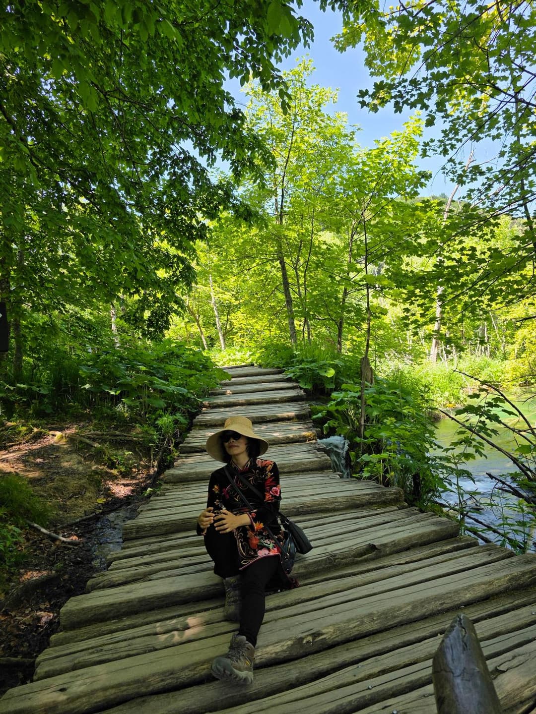 Solid wood front door installation with natural finish
